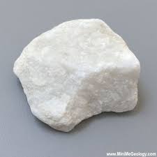 <p>-metamorphic </p><p>-nonfoliated </p><p>-crystalline</p><p>-calcite, quartz, feldspar</p><p>proliths: limestone or dolostone </p><p>regional metamorphism - med grade </p><p>uses: construction</p>