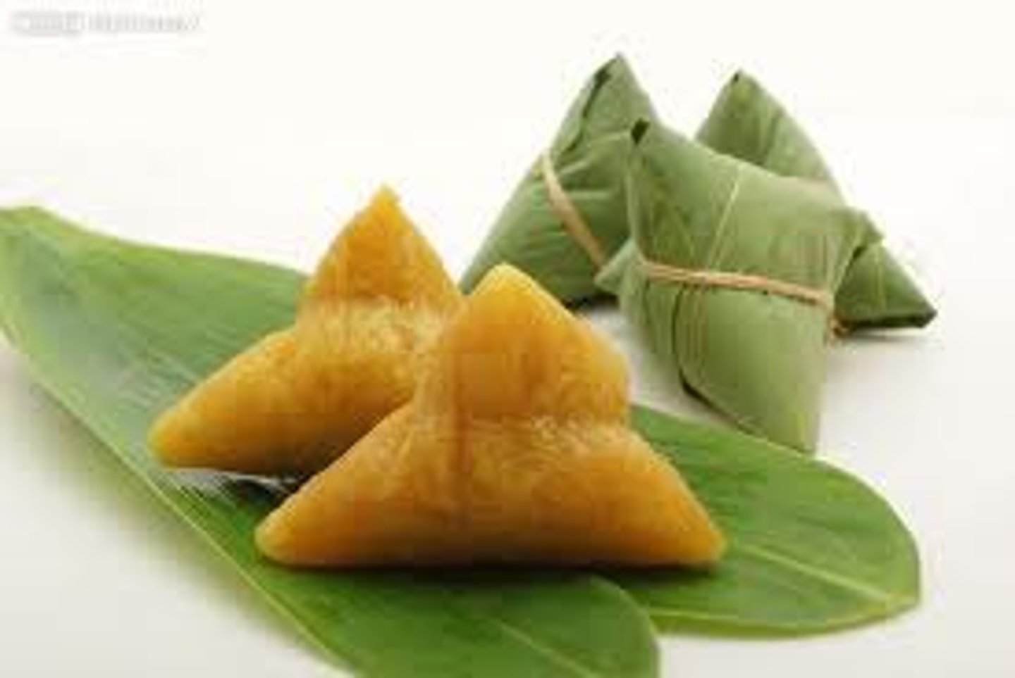 <p>rice dumplings made and eaten during the Dragon Boat Festival</p>