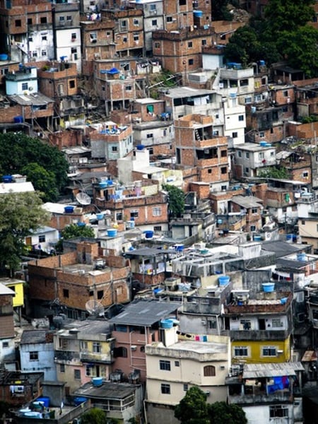 <p>huge slums that surround some Brazilian cities (or other cities in Latin America)</p>