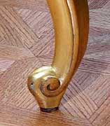 <p>Carved foot decorated with three scroll or spiraled groove</p>