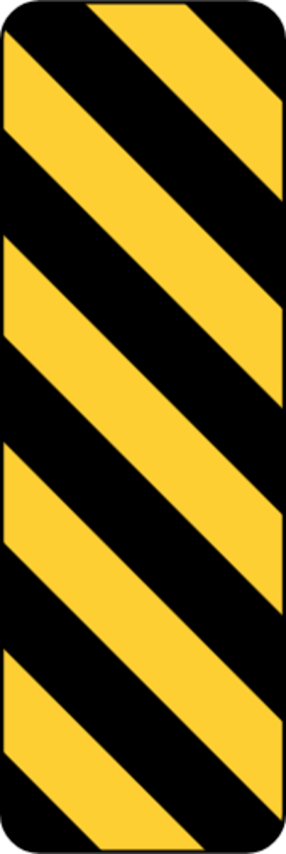 <p>An object marker on a roadway</p>