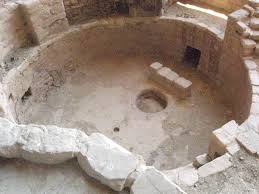 A small hole or indentation in a kiva floor, symbolizing the place of emergence for the Pueblo peoples.