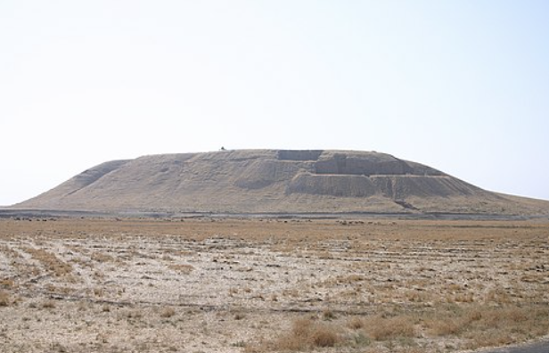 <p>An ancient Mesopotamian term for a man-made mound or hill, often formed by the accumulation of debris from past human settlements. </p>