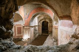 <p>Catacomb of Priscilla; Late antique Europe</p><p>Rome, Italy 200-400 CE, Excavated tufu &amp; fresco</p><p>Catacomb: underground structure</p><p>Earliest Christians and Jews are burried here — Land donated by wealthy Roman woman for her family’s burial — now 40,000 tombs in it</p><p>Open now due to grave robbing and relic hunting (some martyrs here)</p><p>Wealthy had marble, poor had terracotta </p><p>Anchors represent safe harbor, fish represents Christ</p><p>Beardless Jesus points to late antique </p>