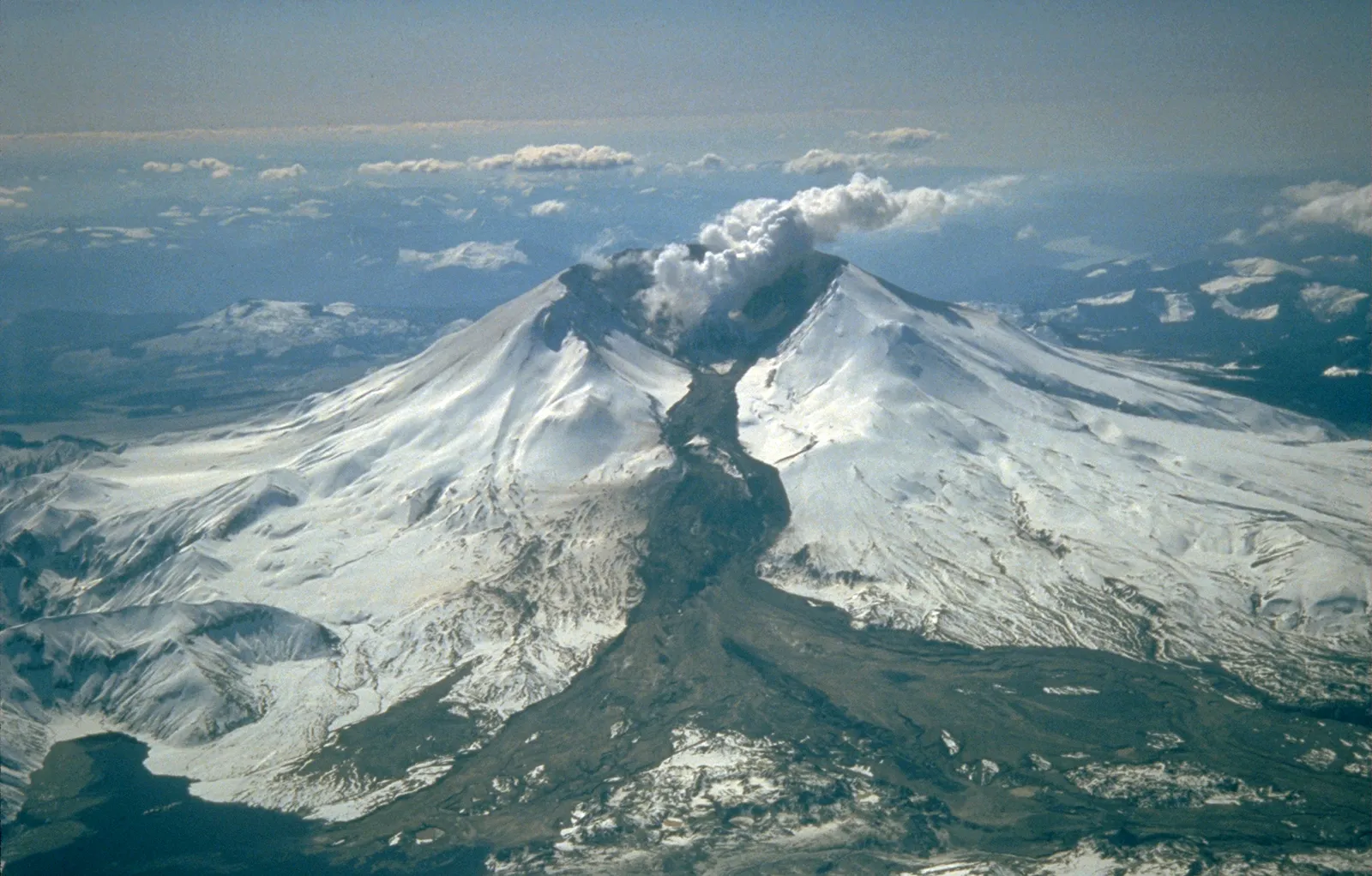 <p>a rapidly flowing mixture of rock debris and water that originates on the slopes of a volcano. A mudslide.</p>