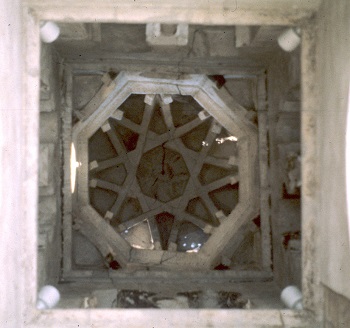 <p>Bib Mardum Mosque, Toledo, 10th century, Hispano-Umayyad Dynasty</p><p>- 9 Unique domes that have symbolic function to remind viewers of cordoba (mother mosque)</p><p>- columns are made of spolia (reused material) bc it is practical and also a sign of conquest</p><p>- foundation inscription that tell us name and date of private patron and competition</p><ul><li><p>Squinches are used —&gt; small arch spanning corner of dome: creates transition from four side —&gt; eight band; square base to round</p></li></ul><p></p>