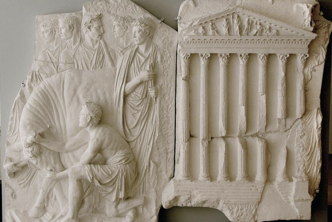 from the art pietas Augustae (altar of augustan piety), plaster cast started by Tiberius, as an altar dedicated to Augustus, finished by Claudius after Tiberius died and Caligula didnt have much time to work on it as he did pretty early on. influenced by the ara pacis a reference too the temple of mars ultra.  