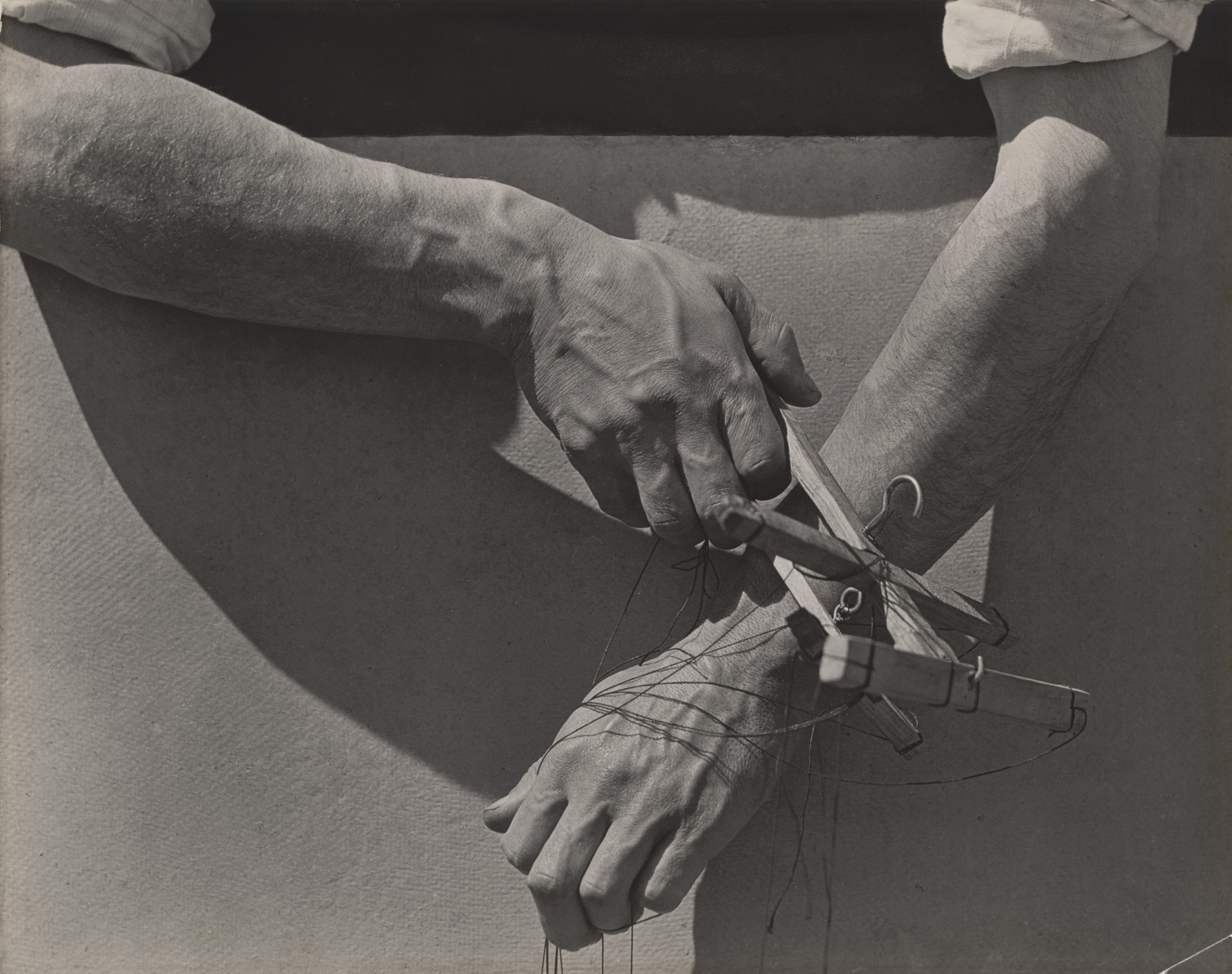 <p>Who photographed "Hands of a Puppet" in 1929?</p>