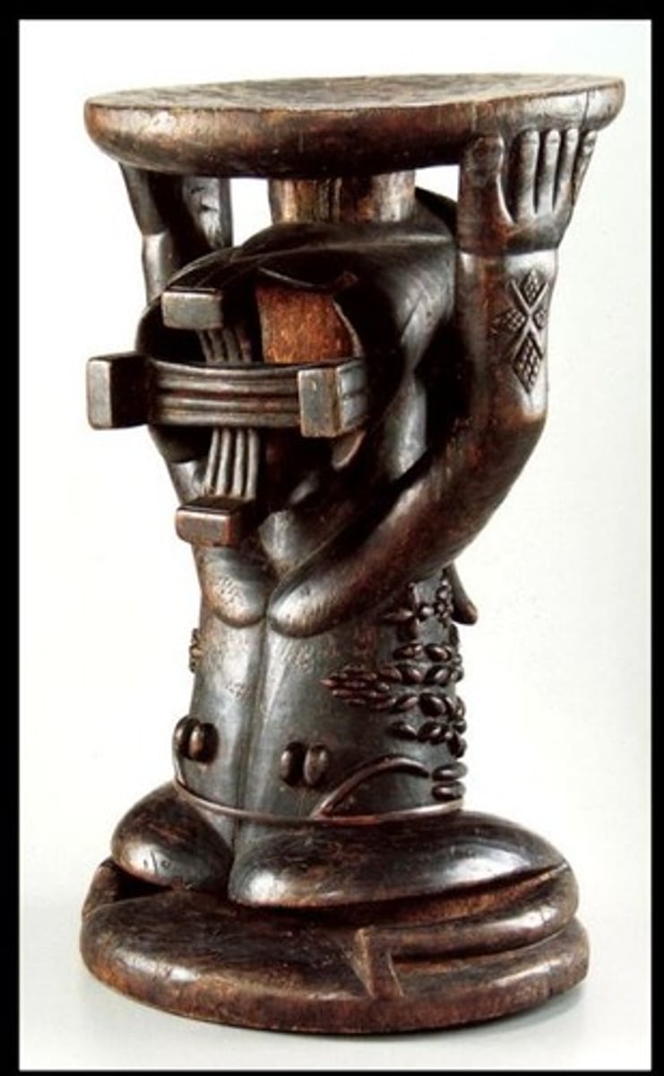 <p>Crossed hair in back of head</p>