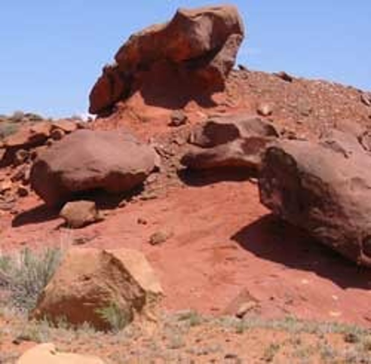<p>Red soils are colored by oxidized iron (Fe³⁺) and indicate well-drained, highly weathered soils that often contain clay and iron oxide coatings. The red color shows that the soil has had long-term exposure to oxygen.</p>