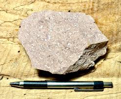 <p>-igneous</p><p>-volcanic</p><p>-aphanitic</p><p>-felsic</p><p>-K-feldspar, quartz, biotite</p><p>-forms at the end of BRS</p><p>uses: construction </p>