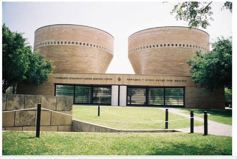 Cymbalista Synagogue and Jewish Heritage Center
Rectangular volumes rotate and open up into a circular shape – transition from Earth 
(symbolized by the square) to Heavens (symbolized by the circle)
Inscribed square roof within the circle creates arched segments that filter light down into spaces
interior: gold sandstone
exterior: red sandstone