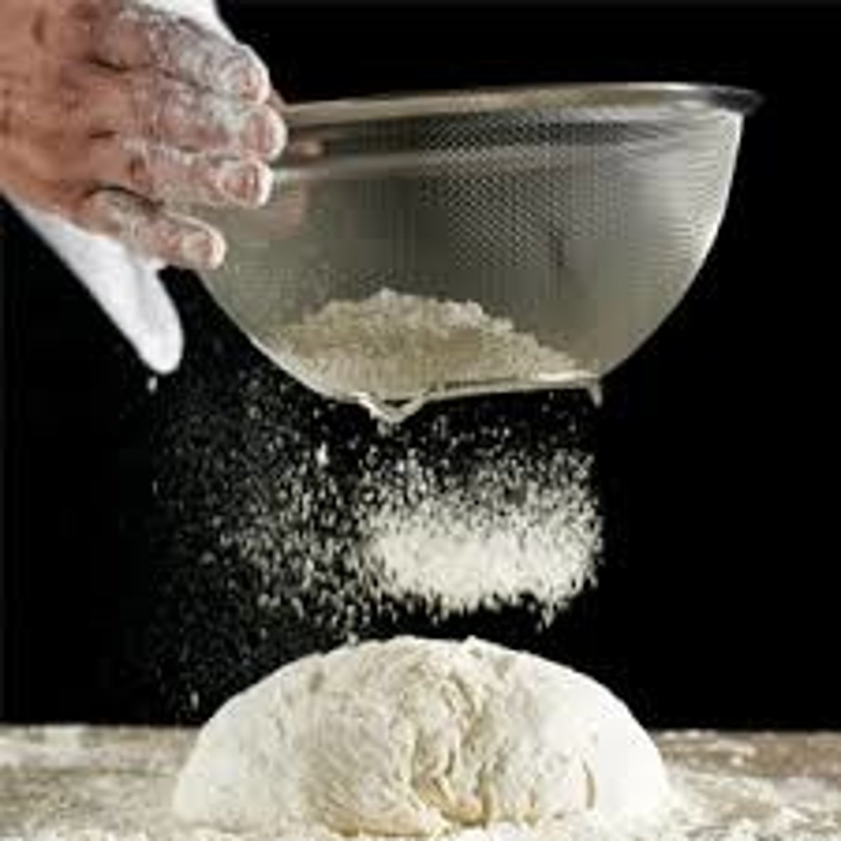 <p>to put through a strainer to separate or break up lumps.</p>