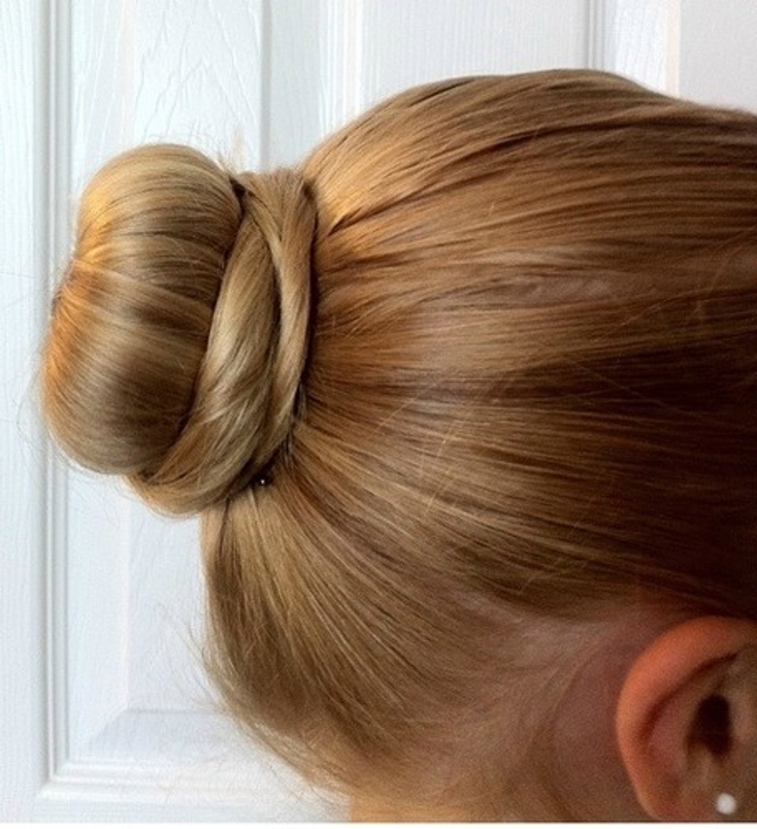 <p>pulled back hair</p>