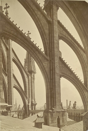 an arched stone support on the outside of buildings, which allows builders to construct higher walls