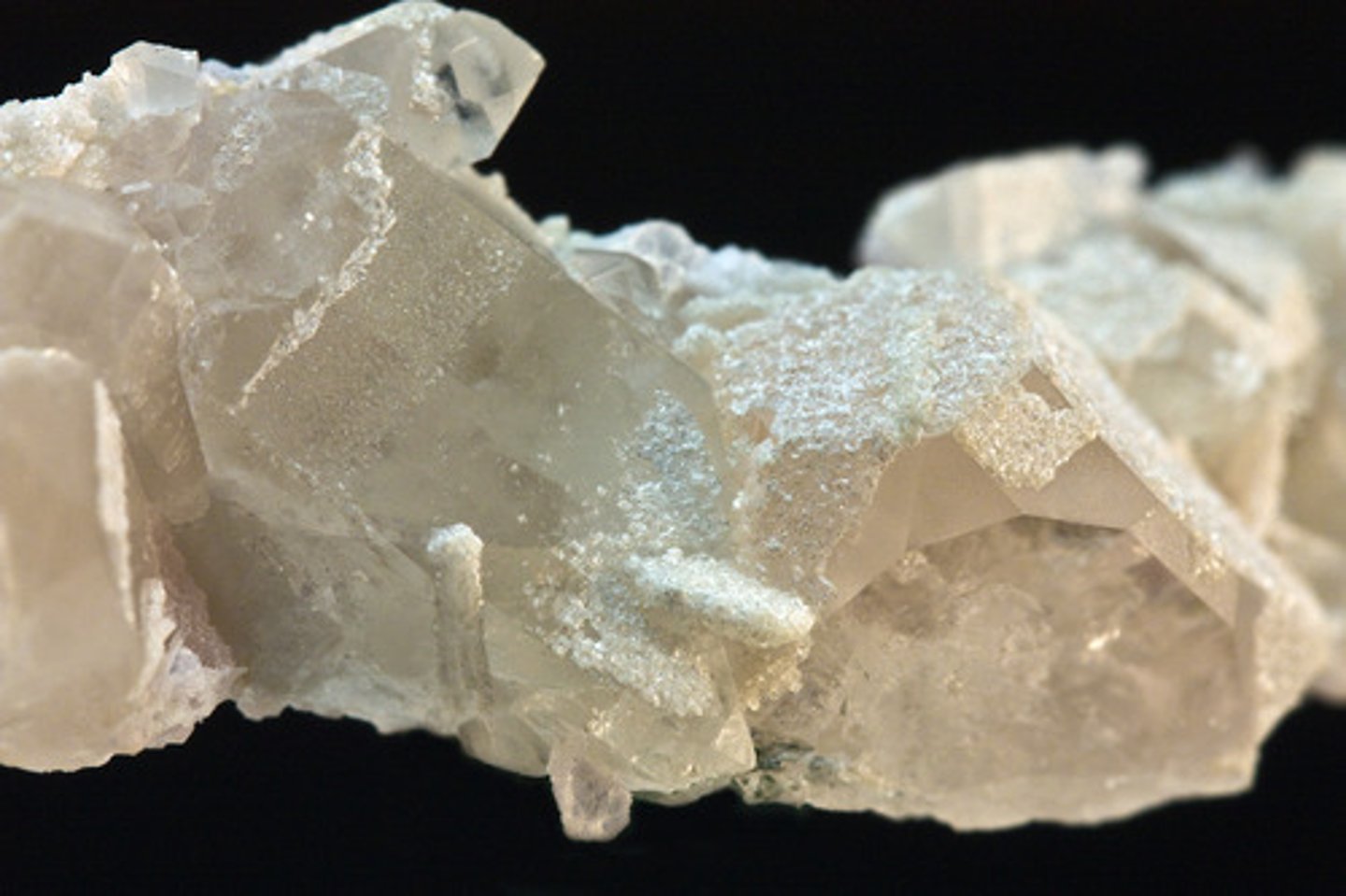 <p>White, tan, or cream feldspar</p>
