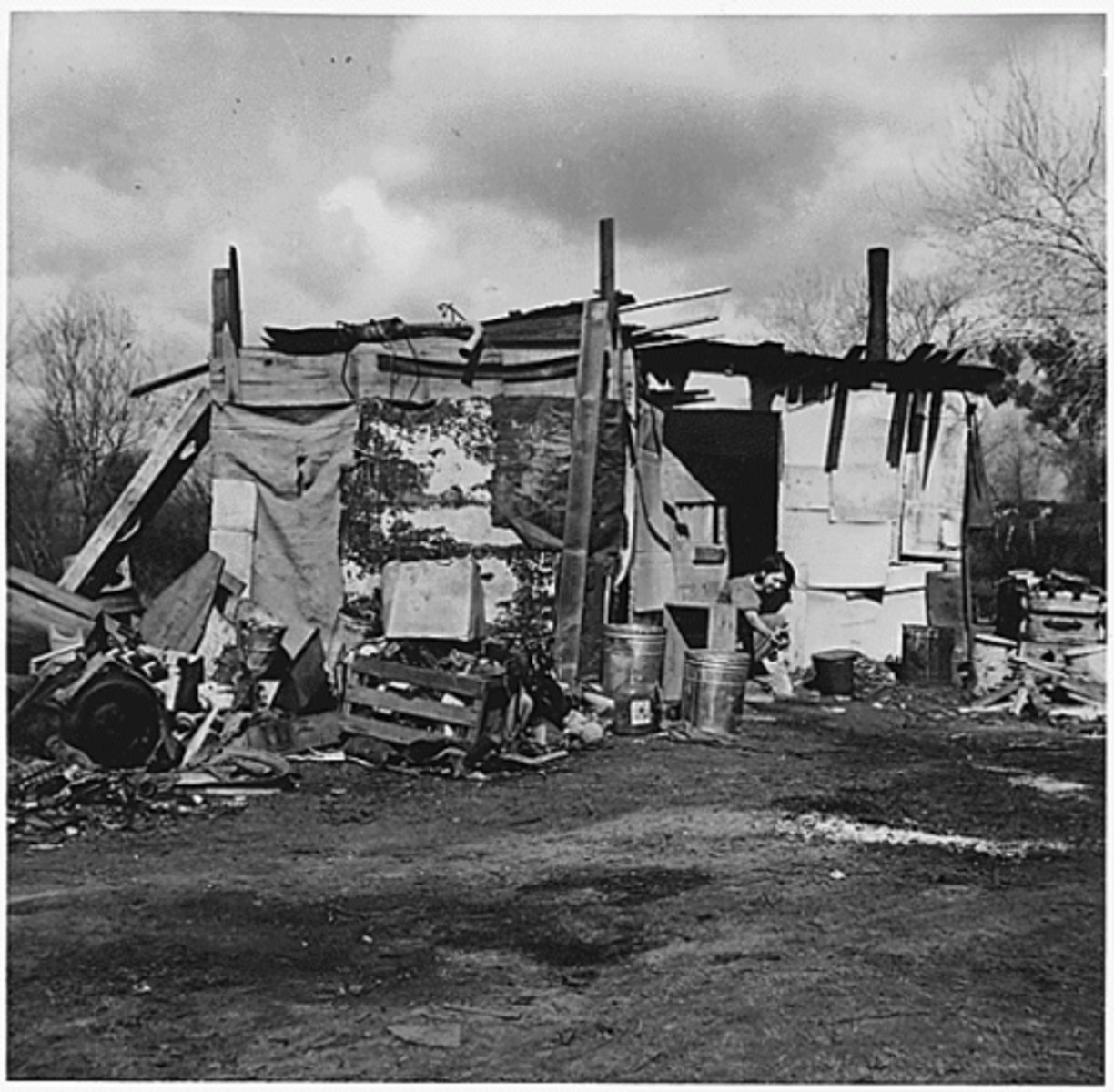 <p>Grim shantytowns where impoverished victims of the Great Depression slept under newspapers and in makeshift tents. Their visibility (and sarcastic name) tarnished the reputation of the Hoover administration.</p>