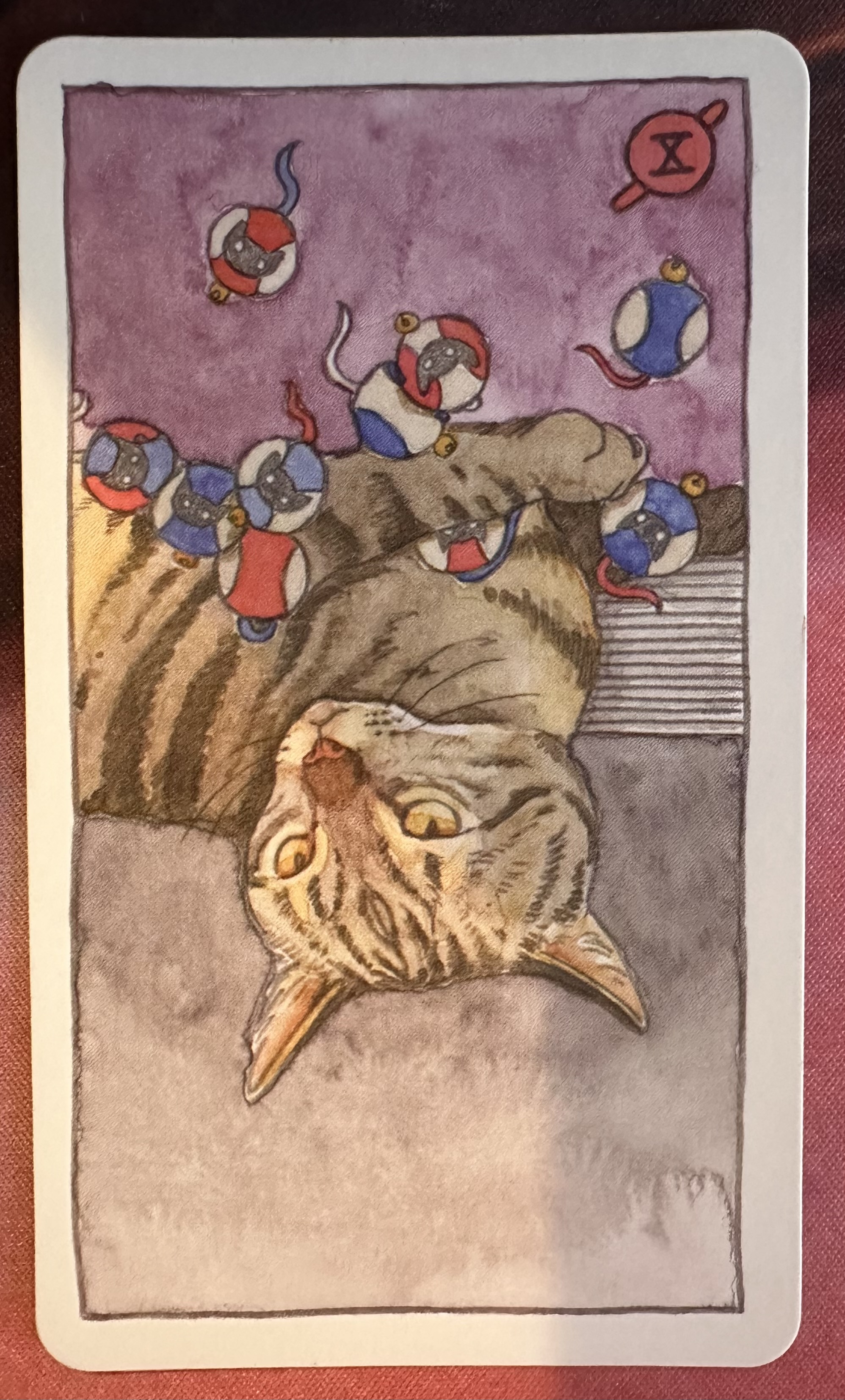 <p>Ten of Wands (X) Reverse</p>