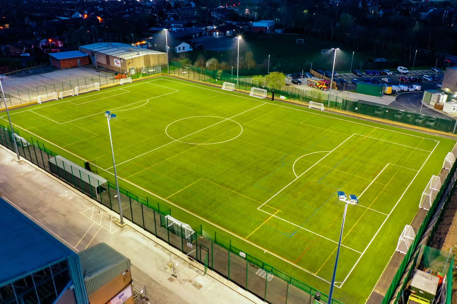 <p><span>An outdoor area for playing football, rugby, hockey (UK)</span></p>
