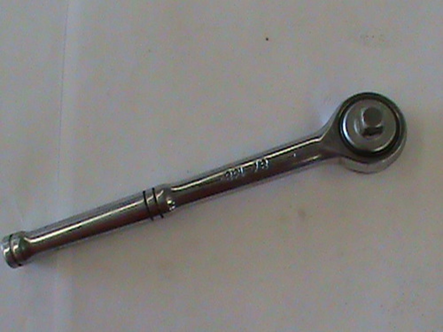 <p>A drive tool used for tightening or loosening fasteners without having to remove and reposition the tool for every turn. Is reversible. Great for tight spaces. (One part of the socket wrench; the other part are the interchangeable sockets)</p>