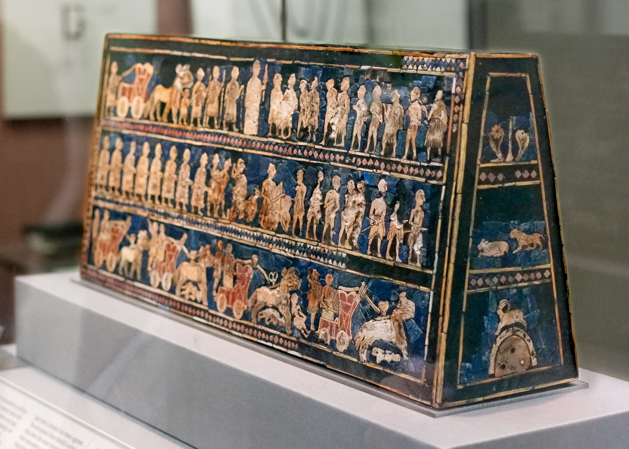 <p>Standard of Ur</p><p>A Sumerian artifact from around 2500 BCE, showcasing the duality of war and peace. It is a rectangular box made of wood, inlaid with lapis lazuli, shell, and red limestone. The narrative scenes depict war victories and peaceful celebrations, illustrating social hierarchy, showcasing the duality of war and peace. The narrative scenes depict war victories and peaceful celebrations, illustrating social hierarchy, and it provides insights into early Mesopotamian civilization, particularly in politics and culture. Additionally, it is considered a masterpiece of Sumerian art and reflects the technological advancements in craftsmanship of the time.</p>