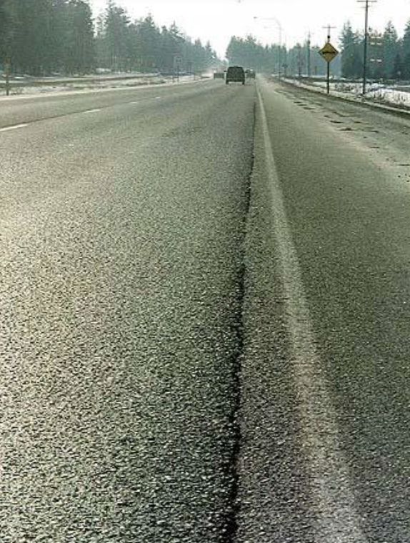 <p>Longitudinal or traverse cracks to CENTERLINE, caused by poor construction, shrinkage, and reflective cracks, TOP down, most common distress in GA</p>