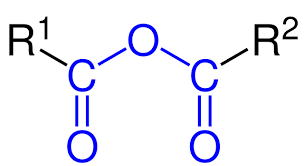 two carbons double bonded to oxygen, joined with an oxygen