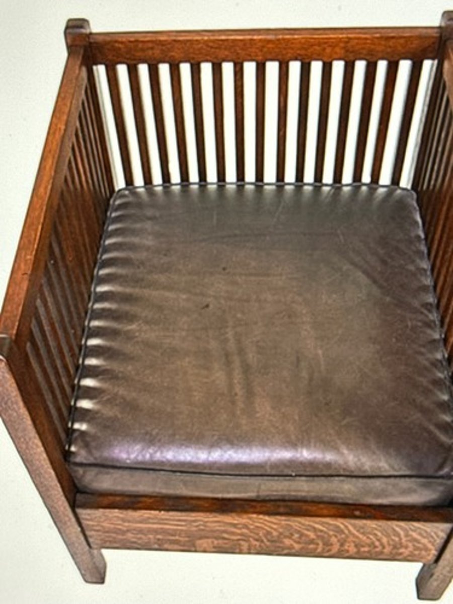 <p>Gustav Stickley<br>kicked off a design trend, more chairs like this came afterward<br>(im sorry it was the only photo option it gave me)</p>