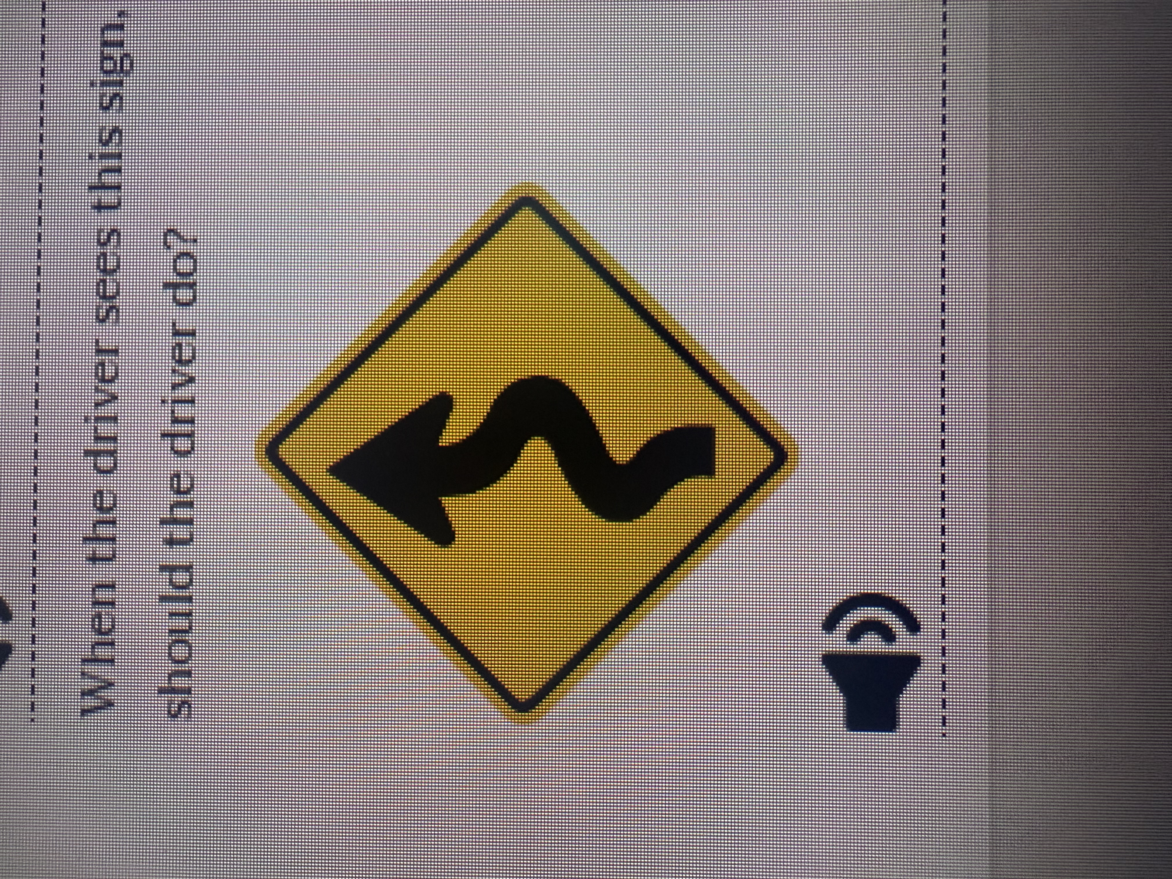<p>When the driver sees this sign what should the driver do</p>
