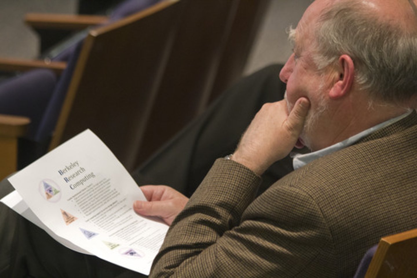 <p>(n.) a piece of paper with information, often given out before a presentation</p>