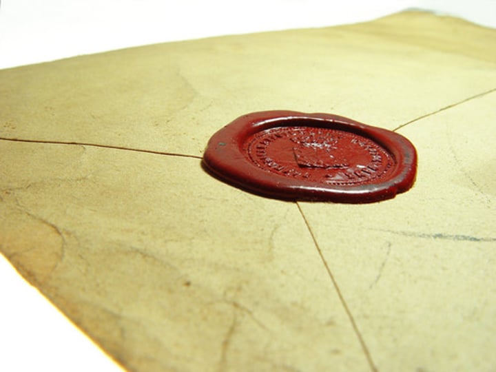 <p>closed tightly<br>-A prisoner of fate to a future that has<br>been sealed in advance.</p>