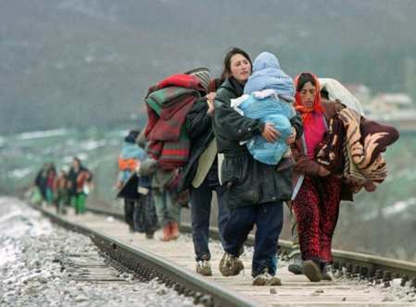 <p>a person who has been forced to leave their home or their country, either because there is a war there, because of their political or religious beliefs, or because of natural disaster</p>