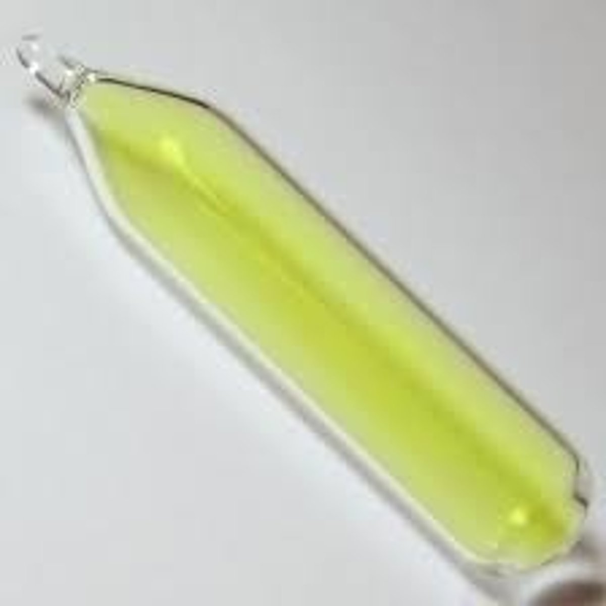 <p>A bright yellow liquid that turns to a pale yellow gas at room temperature</p>