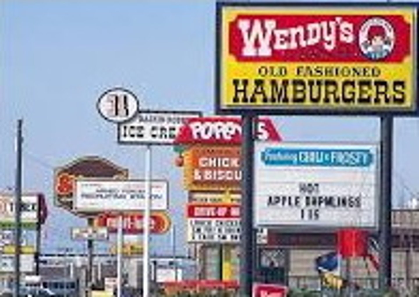 <p>the loss of uniqueness of place in the cultural landscape so that one place looks like the next....a result of globalization & pop culture</p>