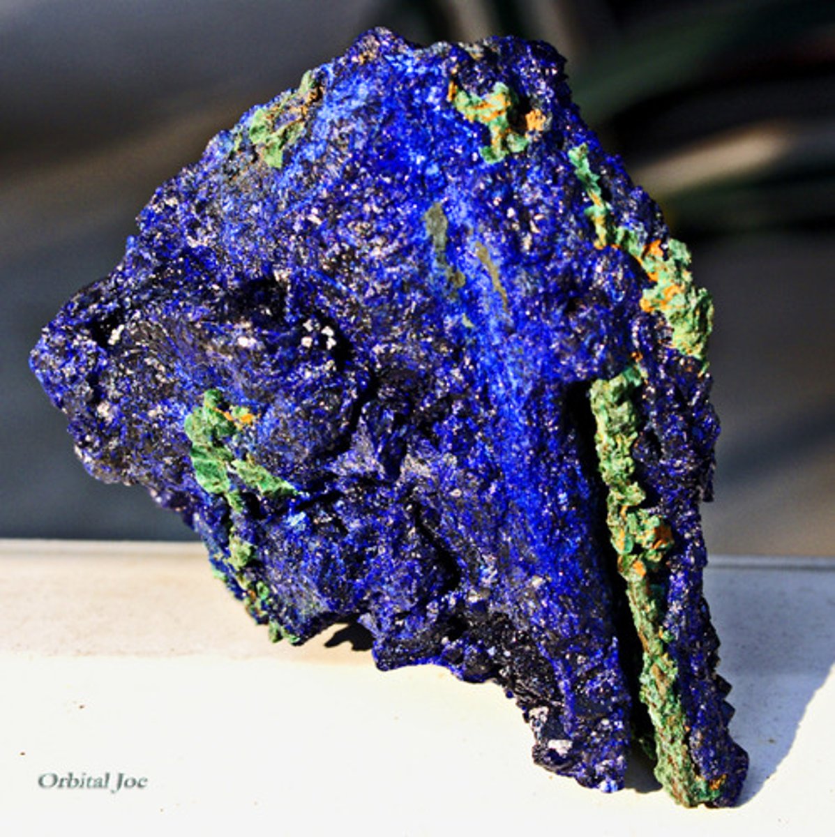 <p>Blues, with streaks. Glossy.</p>