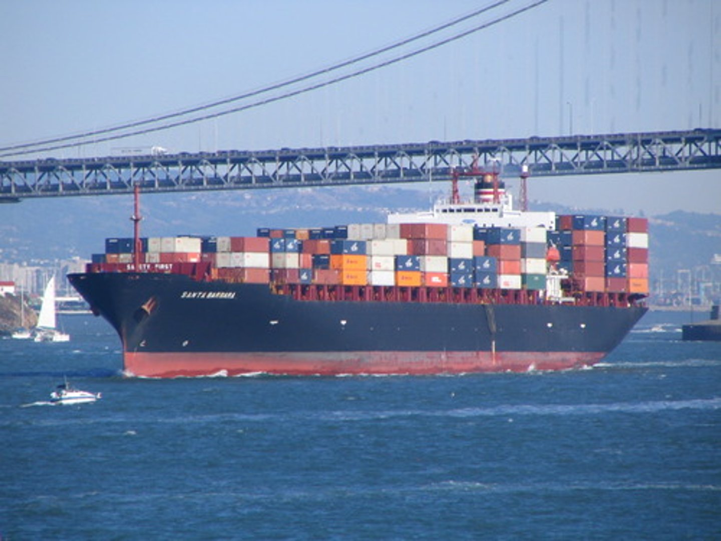 <p>Movement of goods using ships/transport using standard containers</p><p>able to move large volumes of products at cheaper prices</p><p>e.g., HMM Algeciras, 24,000 containers</p>