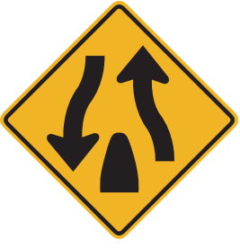 The divided highway on which you are traveling ends 350 to 500 feet ahead. You will then be on a roadway with two-way traffic. Keep to the right. 