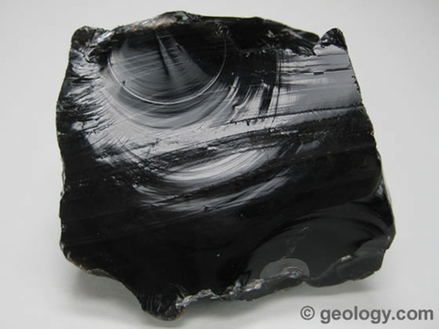 <p>Rock that forms from the cooling and solidification of lava at Earth's surface. If it cools fast, it is fine grained, and if it cools very fast, it is glassy. See image.</p>