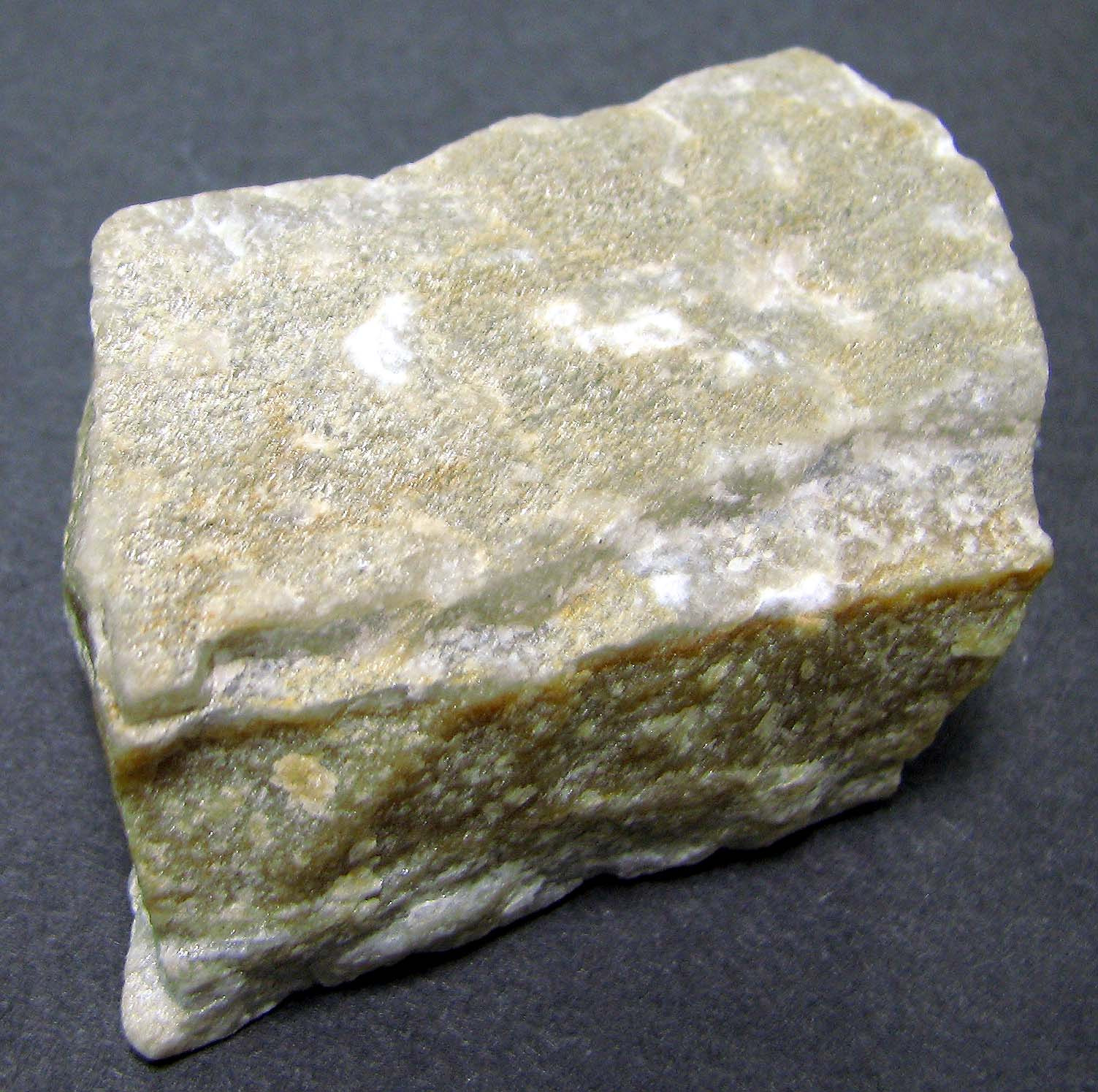 <p>Scratches glass, non-foliated, parent rock sandstone, metamorphic</p>