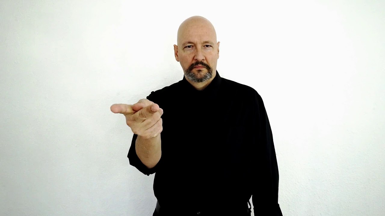 <p>Move the “K” handshape side to side in front of you</p>