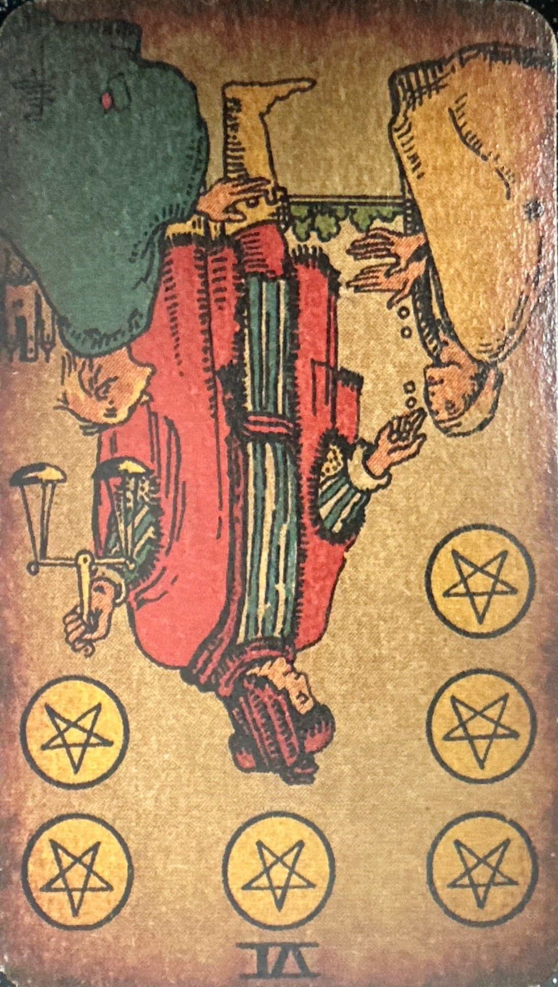 <p>VI - Six of Pentacles (Reversed)</p>