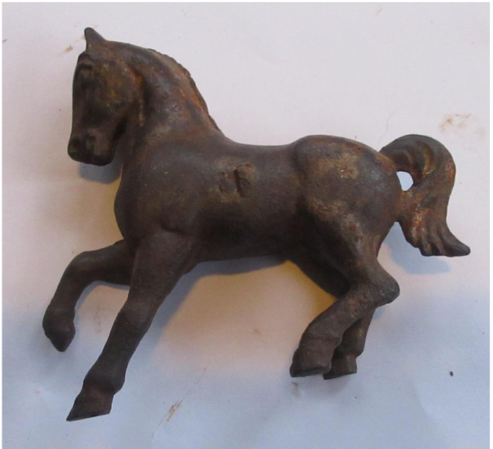 <p>Toy banks manufactured in 19th century along with molded cast iron toys</p><p>Toy banks encouraged children to save money; screw could be taken out of this to get the money out</p>