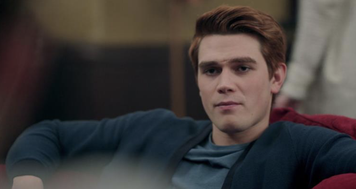 <p>shot of one actor where a part of another actor is showing. This can help orient the shot.</p>