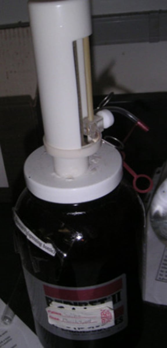 <p>Device that releases its contents in measured quantities.</p>