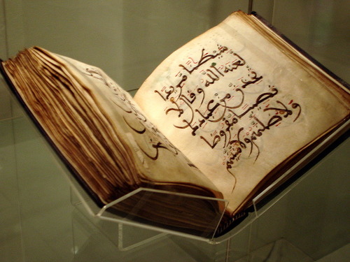 <p>Literally translated as &quot;the recitation.&quot; The sacred text of Islam, divided into 114 chapters, or suras: revered as the word of God, dictated to Muhammad by the archangel Gabriel, and accepted as the foundation of Islamic law, religion, culture, and politics.</p>