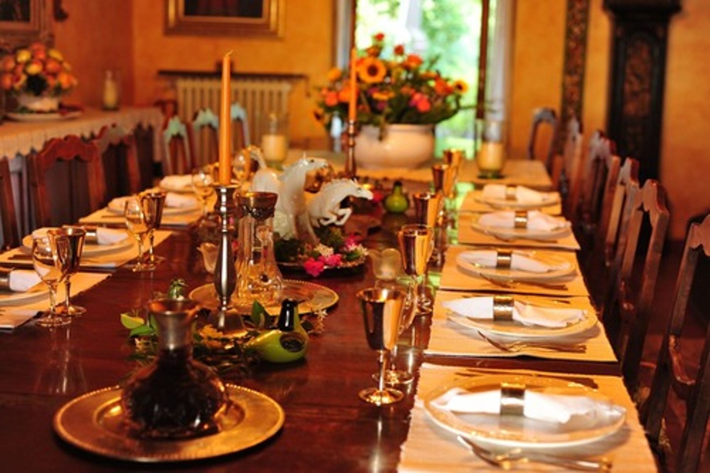 <p>at the (dinner) table</p>