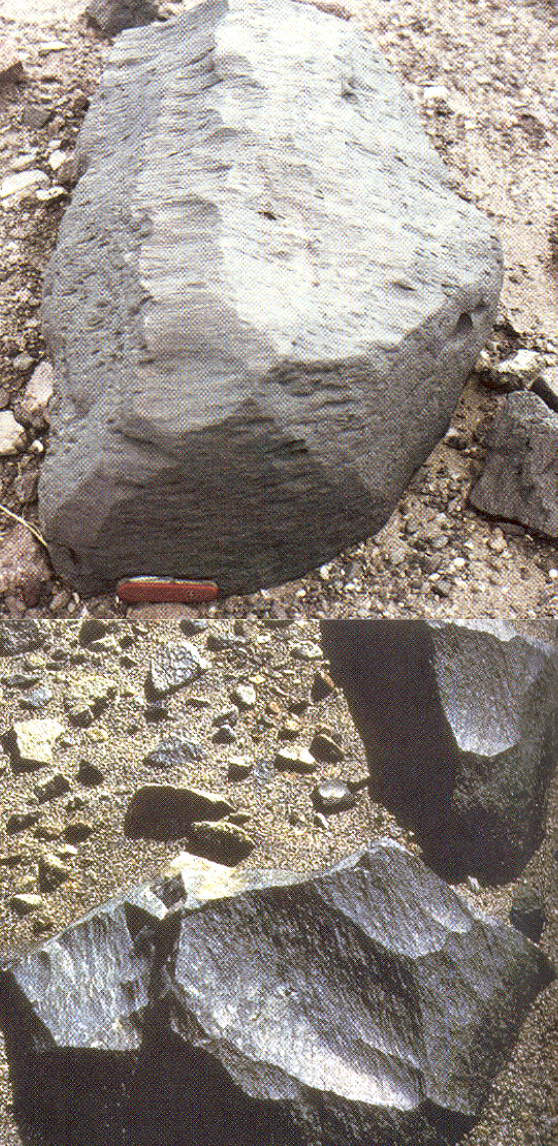 sandblasted rocks on surface, forming smooth facets