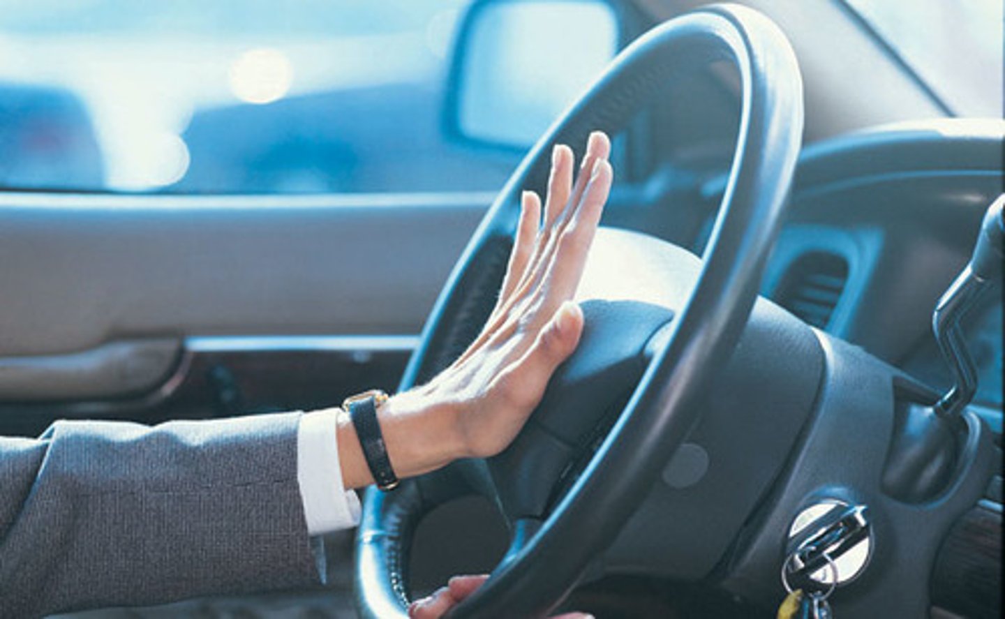 <p>honking the horn</p>