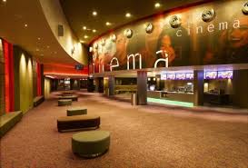 <p><span>the large lobby or entrance area just inside the main doors of a movie theater</span></p>