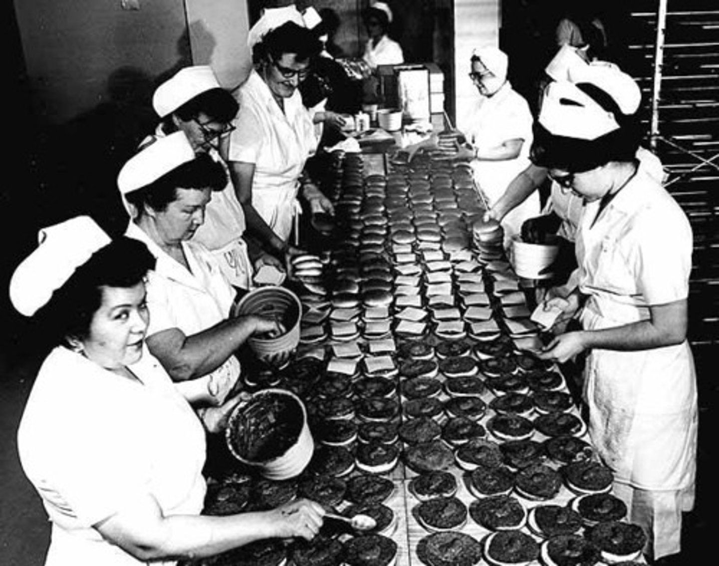 <p>The manufacture of goods on a large scale, usually on an assembly line.</p>